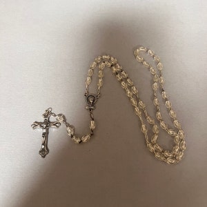 Rosary. Has a Beautiful Crucifix, Medal and Beads. A Nice Gift.