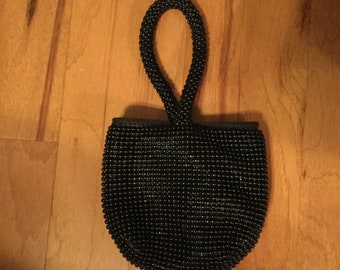 Vintage Beaded Purse. Has Beautiful Black Beads. Handle is Very Stylish. Perfect for an Elegant Evening.