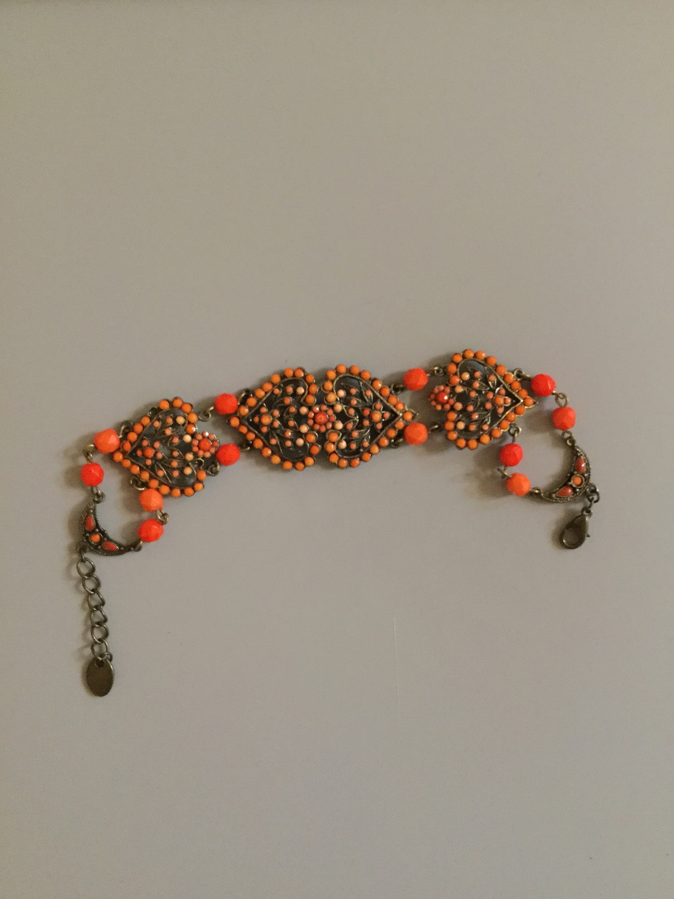 Superbe BRACELET VINTAGE Orange rouille gravé fleur état NEUF