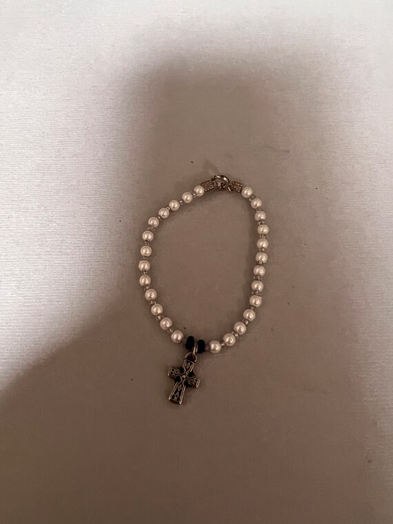 Beaded Charm Bracelet. Has a Beautiful Cross and a