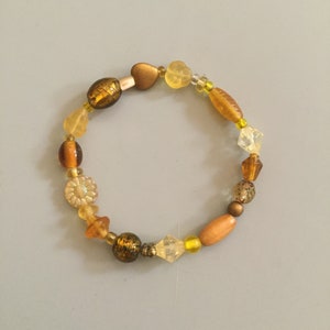 Vintage Beaded Bracelet. Has a Variety of Cute Beads with Nice Colors. Fun Addition to Your Fun Day Out. Fun, Fun, Fun.