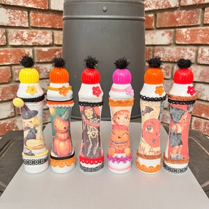 Decorated Bingo Daubers with Beautiful Vintage Like Halloween Images. Has Fun Ribbons, Pom Poms, and Glitter. A Nice Gift. Sold Separately.