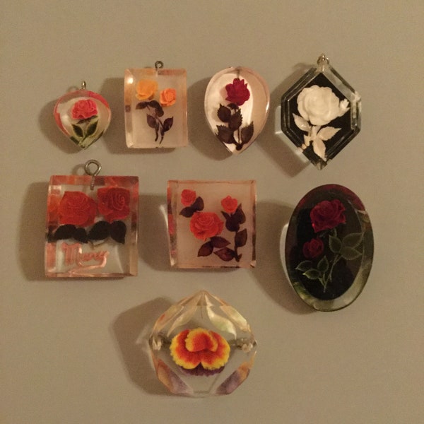 Vintage Lucite Reversed Carved Flower Pendants and Brooches. Sold Separately. Favorite an item receive 20% off.