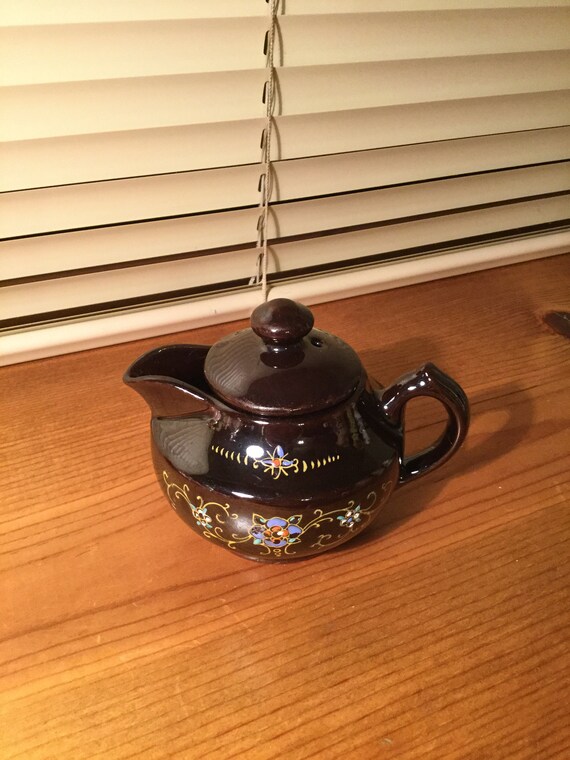 Vintage Small Tea Pot. Made in Japan. Has Beautiful Flowers and Designs. A One Cup Serving Tea Pot. Cute. 
