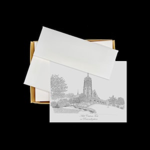 May include: A box of blank note cards with a black and white illustration of a church on the front. The text "Add Custom Text or Personalization" is printed below the illustration.