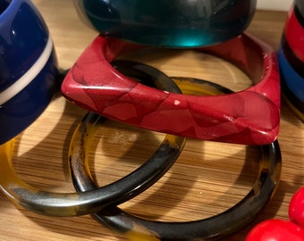 Untested plastic Bracelets  Bakelite?