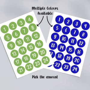 May include: Two sheets of stickers with numbers 1 through 24. The stickers on the left sheet are green and the stickers on the right sheet are blue. The text "Multiple Colours Available" and "Pick the amount" are printed on the sheets.