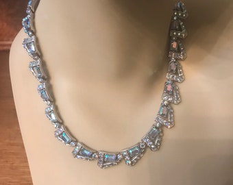 Exquisite Vintage necklace adorned with blue aurora Borealis rhinestones.