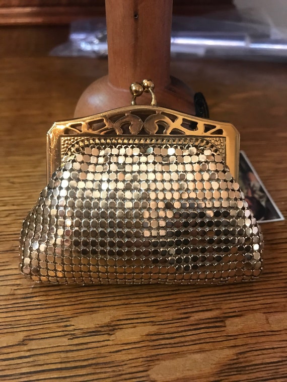 Whitting and Davis golden vintage coin purse.