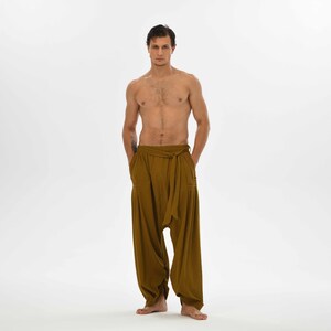 Brown harem pants for men, made from soft cotton, perfect for yoga, casual wear, and bohemian-inspired outfits.