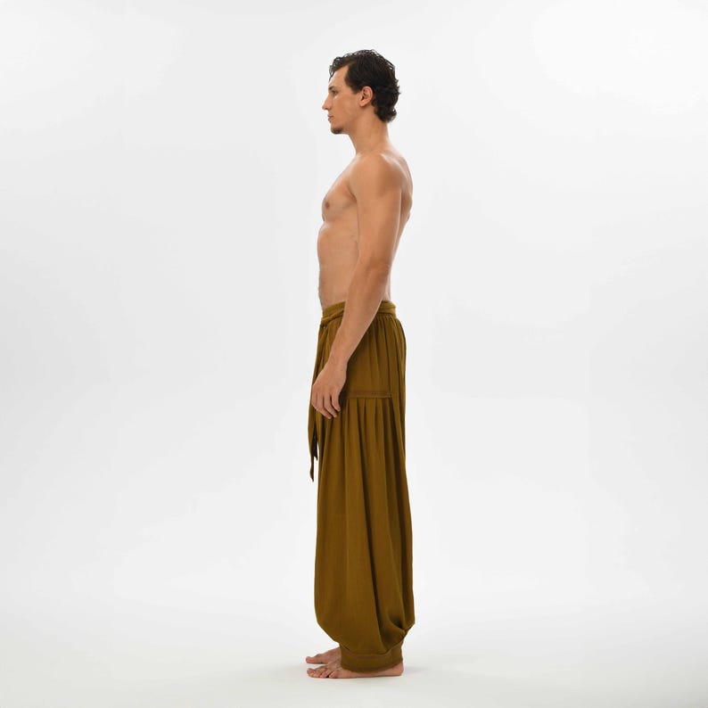 Comfy brown yoga pants for men, crafted from soft cotton with a loose fit, ideal for casual wear, lounging, or festivals.