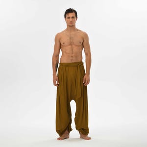 Men’s brown harem trousers with a relaxed fit, made from breathable cotton, perfect for yoga, casual wear, or boho chic outfits.