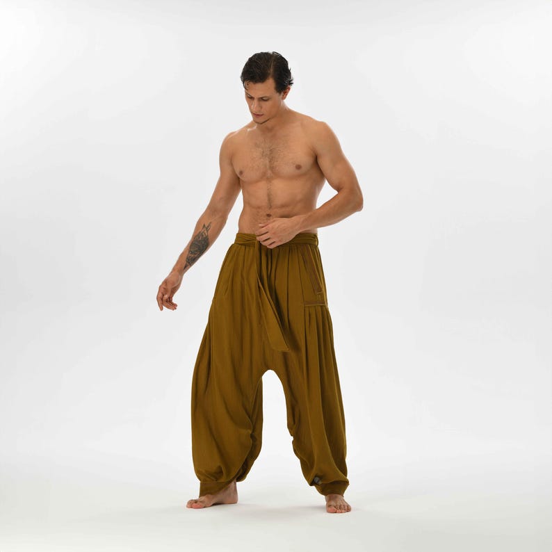 Men’s brown harem pants, crafted from cotton for casual wear, yoga, or boho chic style, offering a loose, comfy fit.