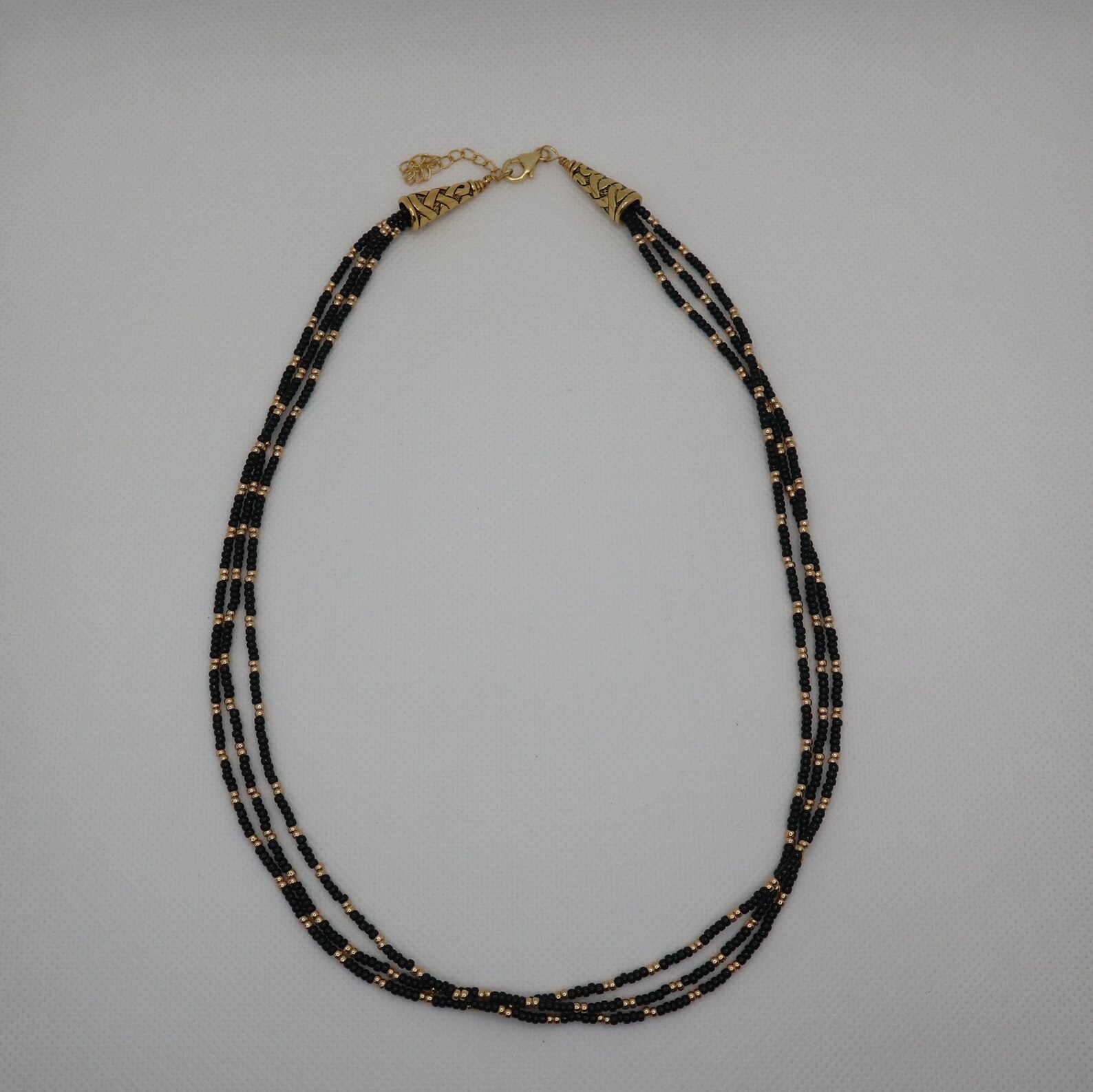 Black and gold bead necklace Etsy