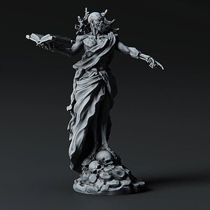 May include: A skeletal figure with a book in one hand and a raised finger in the other, standing on a base with skulls. The figure is wearing a flowing robe and has a skull-like face.