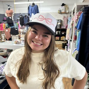 Chic Black & White Trucker Hat with Pink Bow  Stylish, Trendy Adjustable Cap