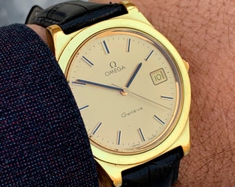 Vintage Omega Geneve, Automatic Winding English made Dennison Stainless case for Omega leather Strap