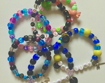 Coraline inspirierte Kandi Armbänder