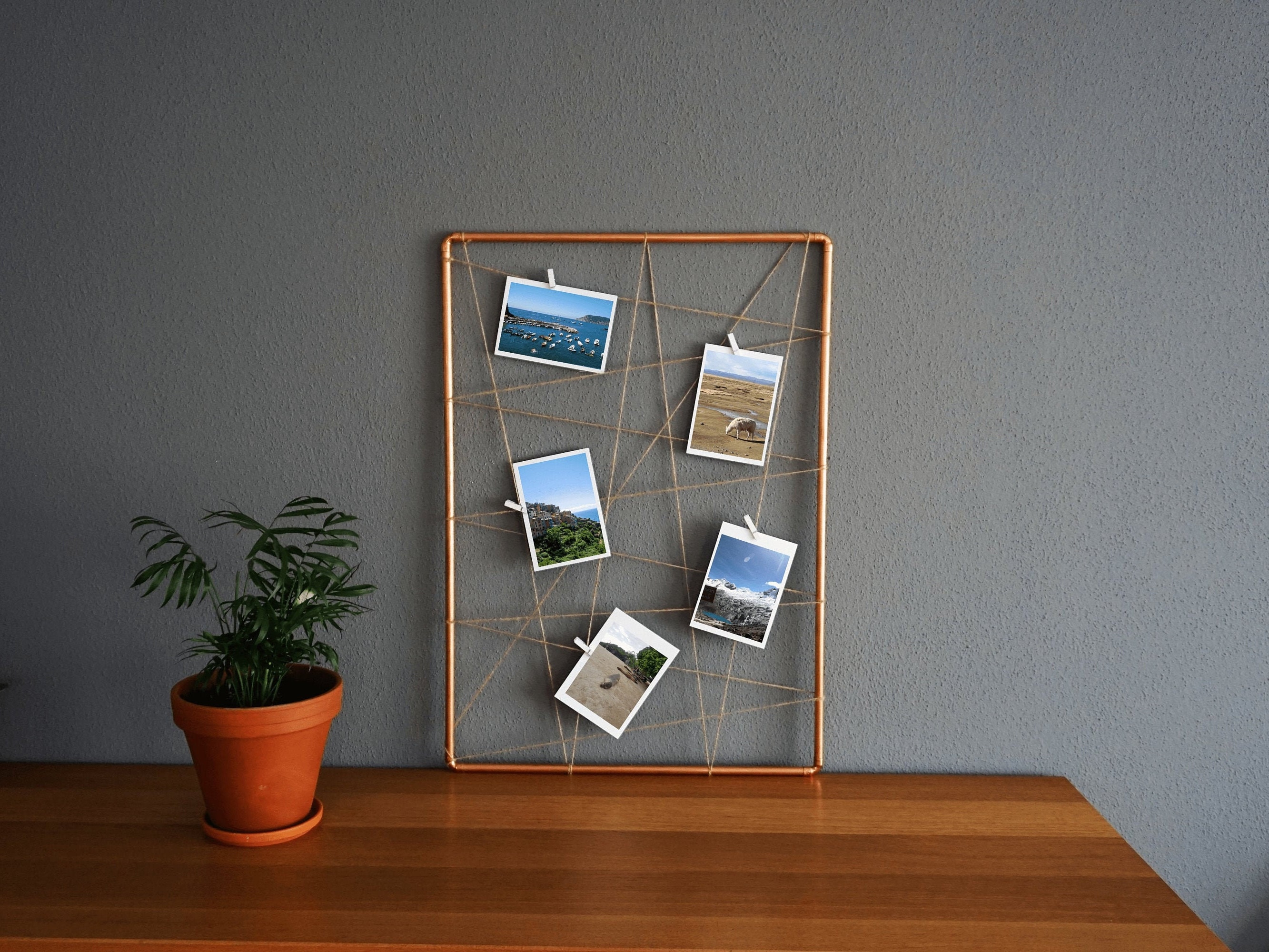 polaroid-fotos-deko-bilderrahmen-idee-schnur-klemmen
