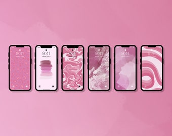 May include: Six different phone wallpapers displayed on six black smartphones. The wallpapers are all pink and feature abstract designs, including marble, watercolor, and geometric patterns.