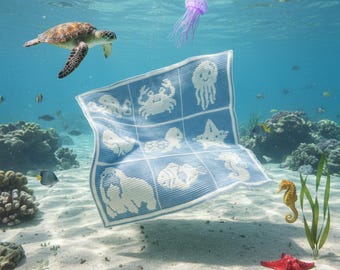 May include: A blue and white crocheted blanket featuring sea creatures like a crab, jellyfish, and seahorse. The blanket is underwater with a sea turtle, fish, and starfish in the background.