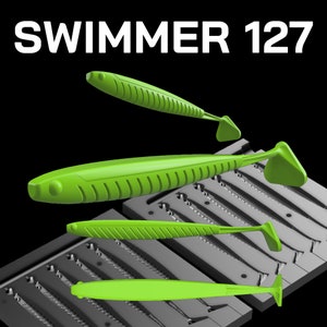 Könnte beinhalten: Eine grüne Kunststoffform zum Herstellen von Angelködern, mit vier grünen Kunststoffködern in der Form. Die Form ist mit "SWIMMER 127" beschriftet.