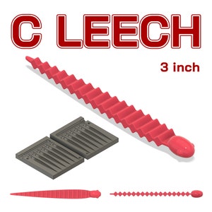 Puede incluir: Un señuelo de sanguijuela de plástico rojo de 7,6 cm con un cuerpo segmentado y una cabeza redondeada. El señuelo se muestra junto a un molde de plástico gris con múltiples cavidades para hacer los señuelos. El texto "C LEECH" y "3 inch" también se muestra en la imagen.