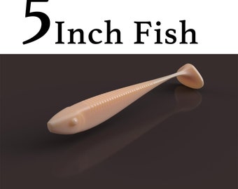 May include: A 5 inch light brown plastic fishing lure shaped like a fish.
