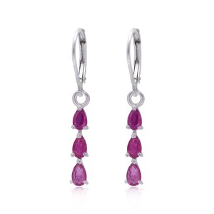 May include: A pair of silver dangle earrings with three teardrop-shaped pink gemstones.
