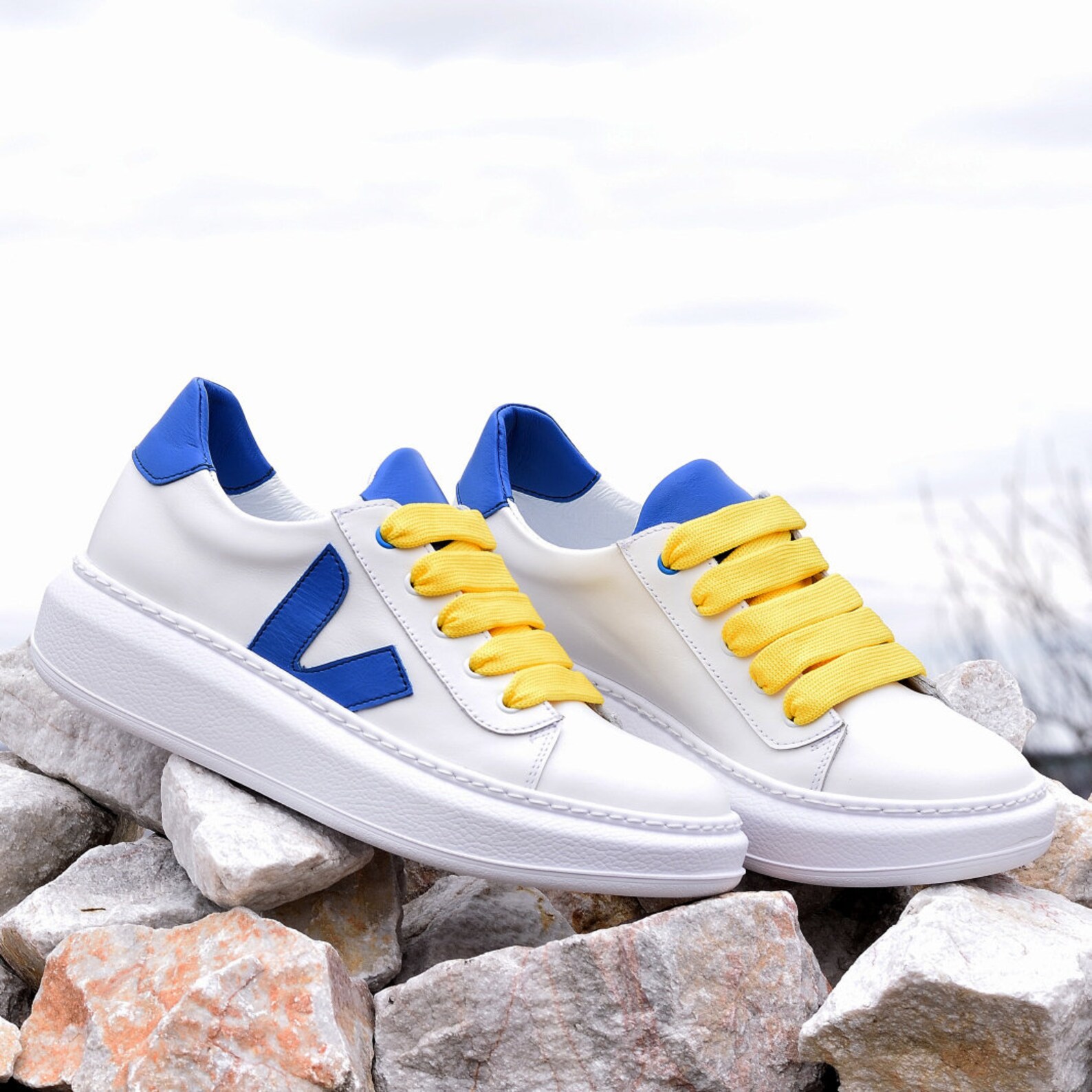 womens white and blue trainers