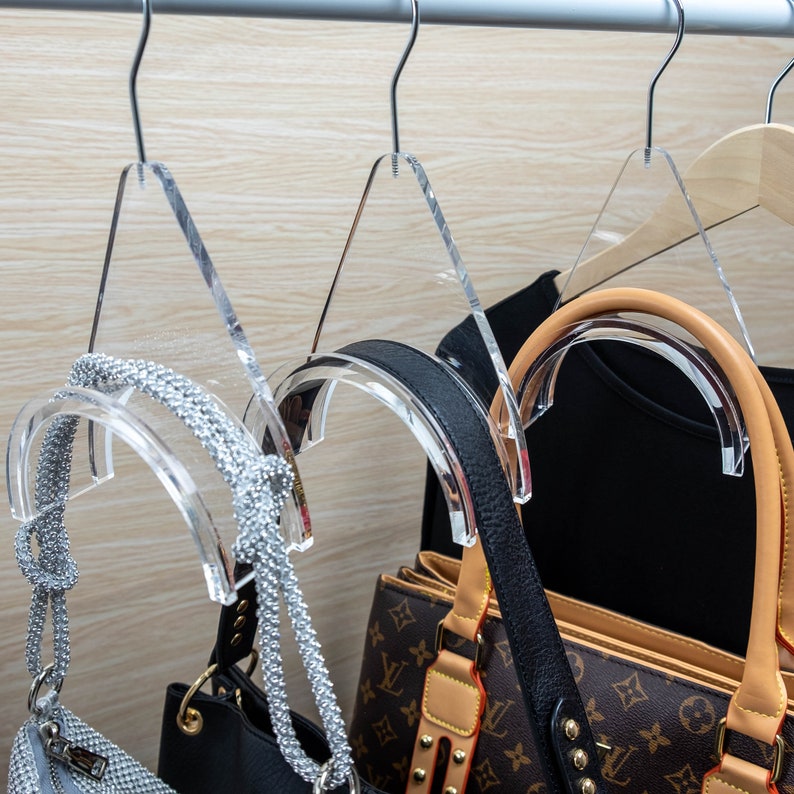 Nuevos colgadores de lujo para bolsos, gancho acrílico para bolsos, que organizan y eliminan arrugas, conservando la forma del bolso. imagen 4