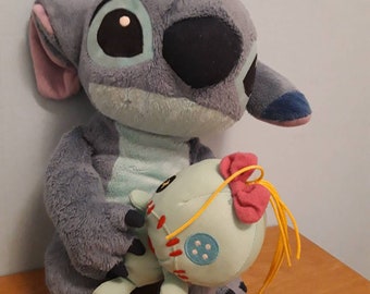 Stitch with his dolly from Disney's Lilo&Stitch, vintage plush toy