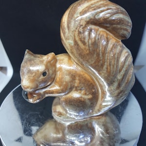 Vintage ceramic figurine of a cute Squirrel