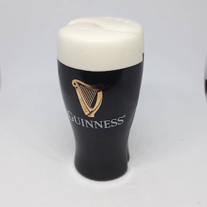 Vintage Guinness beer salt and pepper shakers. Porcelain.
