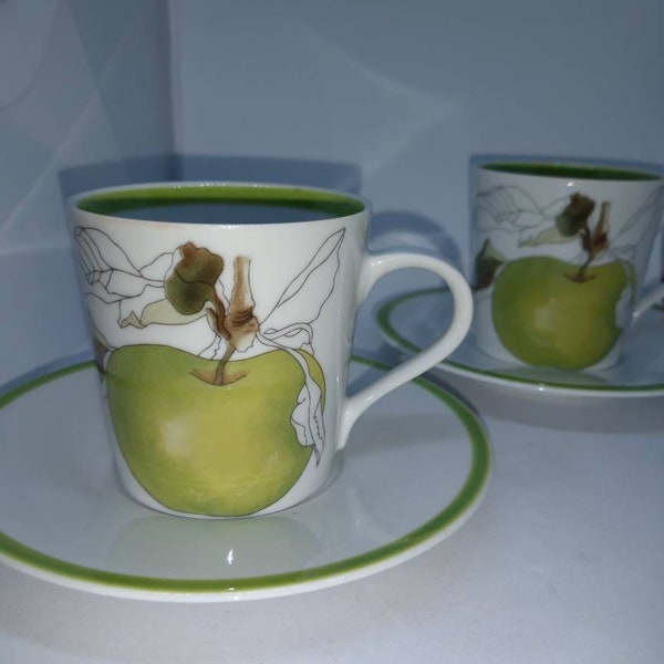 Two very delicate and beautiful teecups with saucers. Inspired by art of Mary Lou Goertzen. From Spal, Portugal