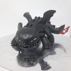 Toothless little dragon figurine from How to train your dragon