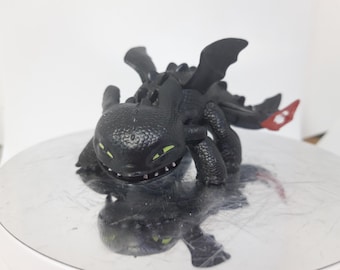 Toothless little dragon figurine from How to train your dragon