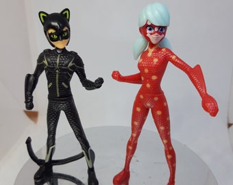 miraculous Ladybug and Supercat figurines