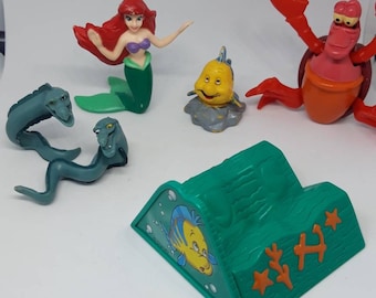 Little collection of Little Mermaid figurines from Disney. 6 pieces