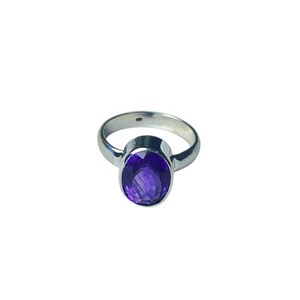 May include: A silver ring with a large oval amethyst gemstone. The ring is simple and elegant.