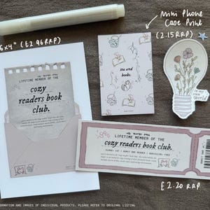 May include: A pink and white printable card with the text "Lifetime Member of the Cozy Readers Book Club." The card is 6 inches by 4 inches and costs $2.96. There is also a light bulb illustration with flowers and the text "In my own world." The light bulb is 1.80 inches in diameter.