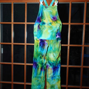 Small Spring&#39;s Glory genderless overalls garment measurements waist 34 hip 38 inseam 29 ice tie dyed in fresh lime, lilac, lemon, and blues