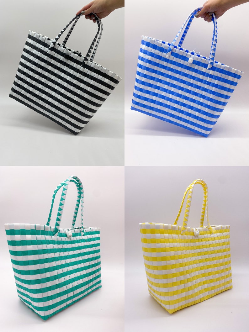 May include: Four striped tote bags in different colors: black and white, blue and white, green and white, and yellow and white.