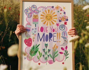 May include: A framed art print with a whimsical design. The artwork features a smiling sun, butterflies, ice cream, and the text "LOVE YOU MORE!!" in colorful letters. The print is set against a striped background with floral and botanical elements.