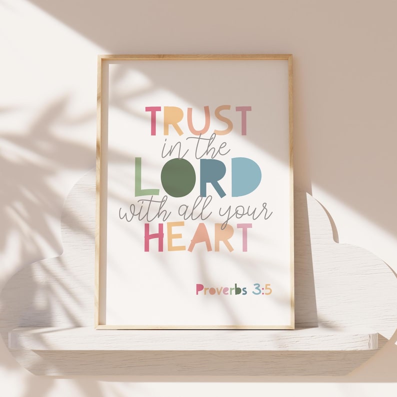 May include: A framed print with a white background and colorful text that reads "TRUST in the LORD with all your HEART" and "Proverbs 3:5".