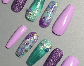 Fingers gesture with purple nail polish on blouse rare
