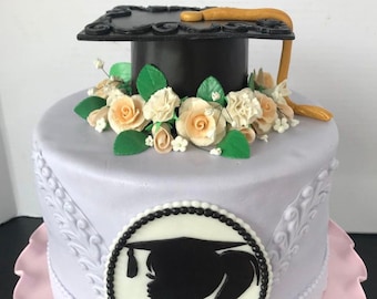Gorro de graduación, silueta y flores de fondant comestible