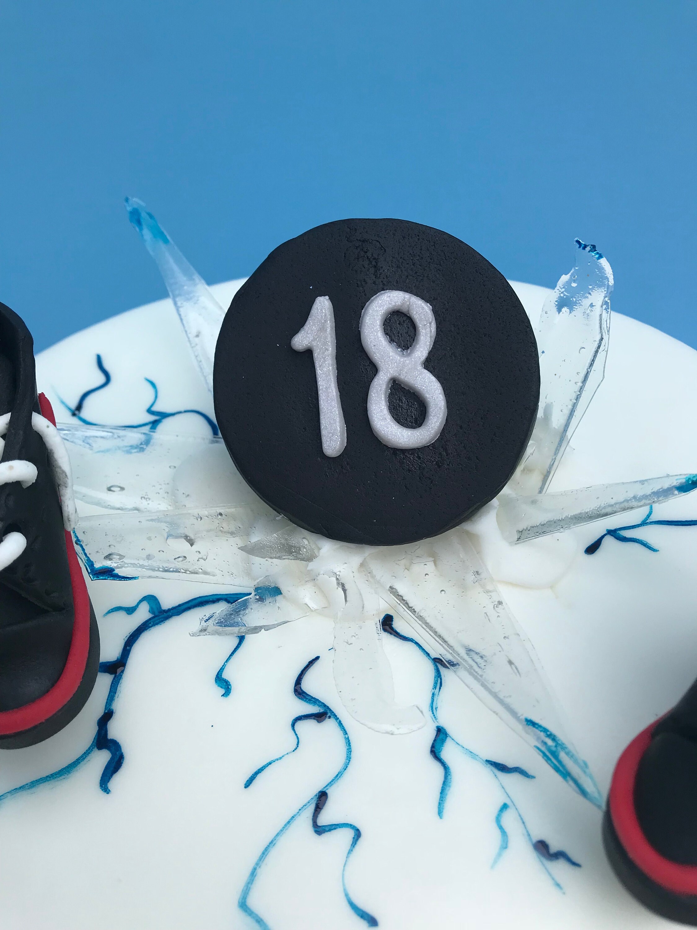Hockey Sticks with Puck 225-A747 Cake Topper