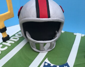 fondant football helmet topper Saskatchewan Roughriders Canadian League Cfl Edible Cake Image ABPID07781 Create a birthday cake with this Edible Cake Topper Image from A Birthday Place Red Football Helmet Ball Edible