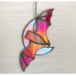 Bat on a Crescent Moon handmade using Stained Glass. Mysterious Symbol, colourful decorative glass art.